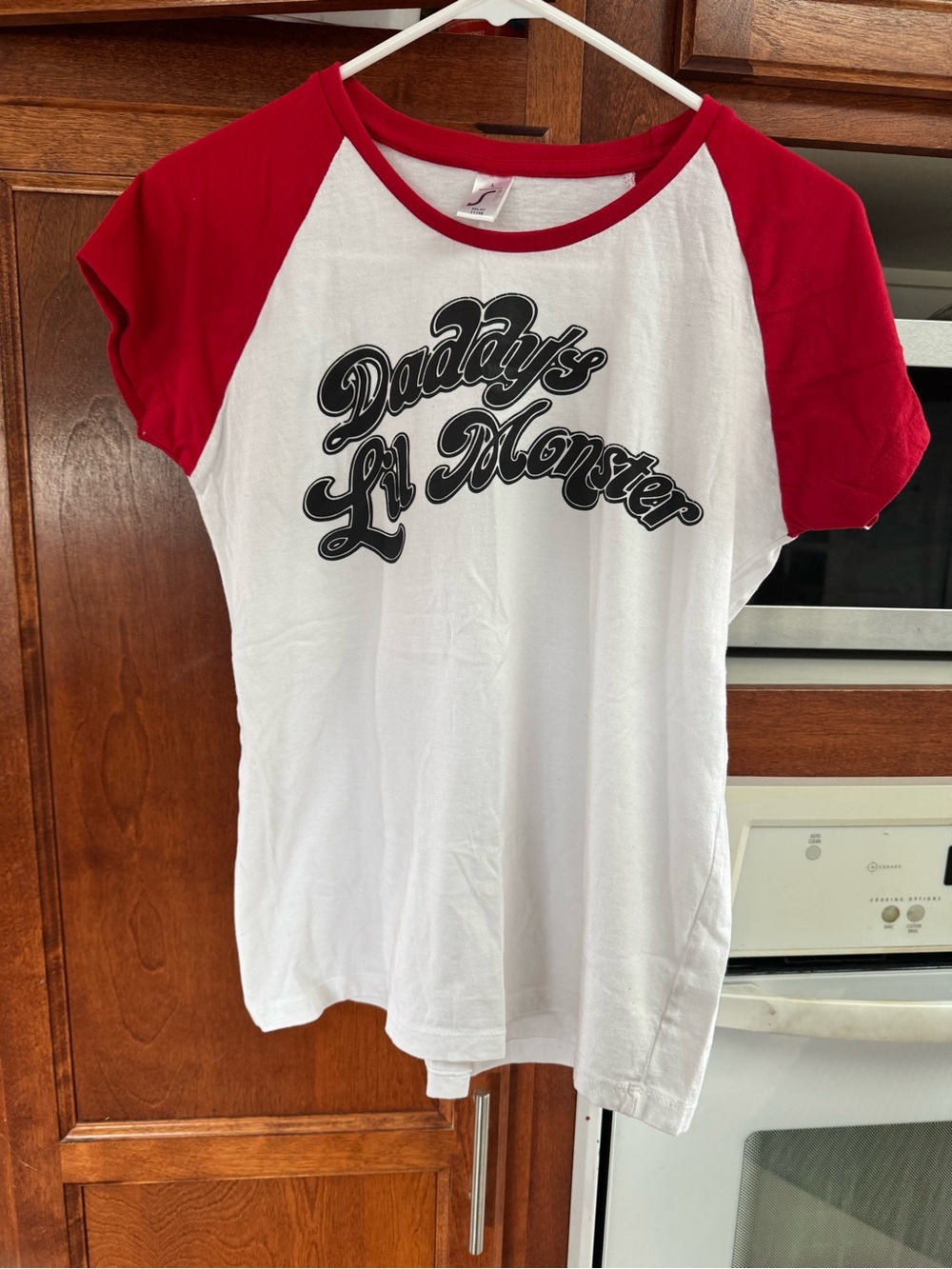 Harley Quinn’s Shirt with ‘Daddy's Lil Monster' Graphic